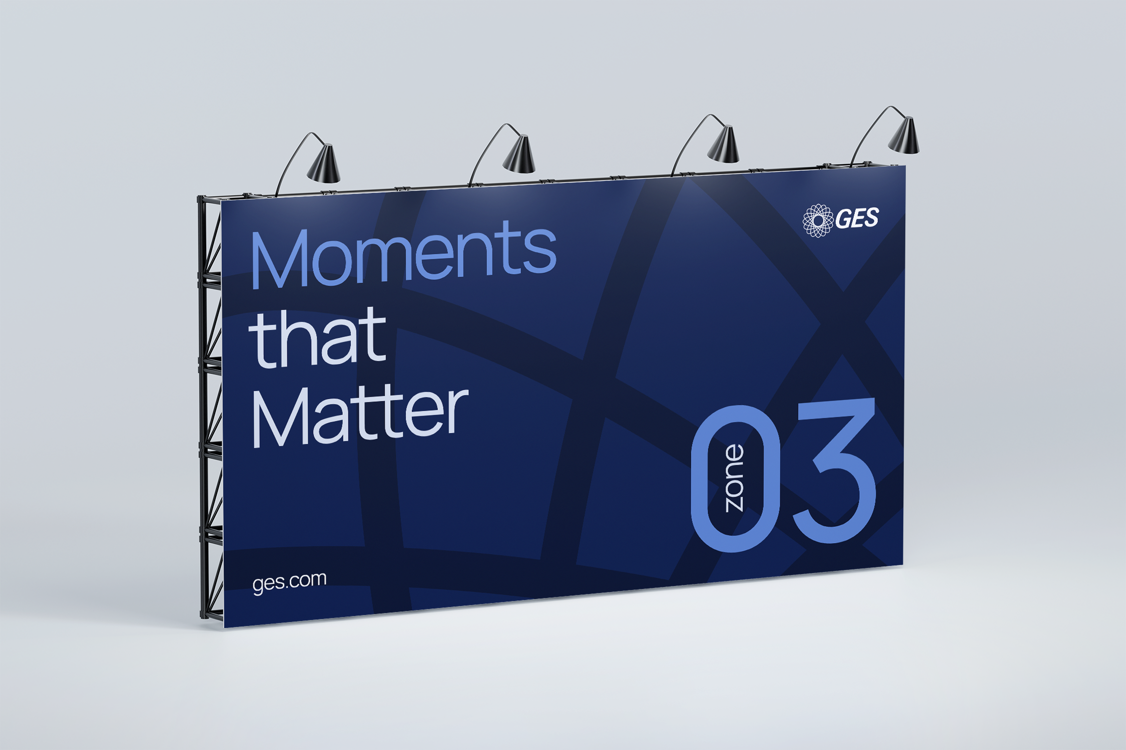 Photo of a study hall area with desks and people studying.